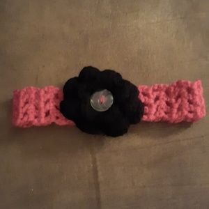 Hand-knitted pink headband with black flower new